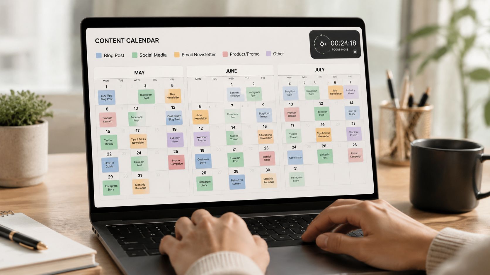 A person using a laptop to view a detailed three-month content calendar planning schedule on the screen.